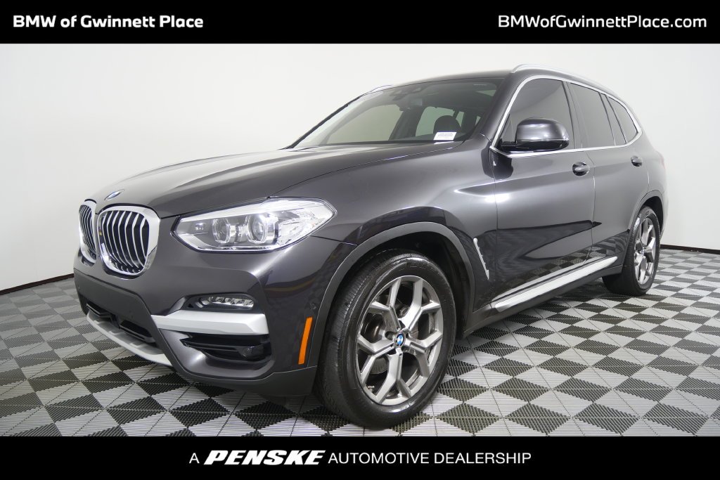 Used 2021 Dark Graphite Metallic BMW sDrive30i image 1