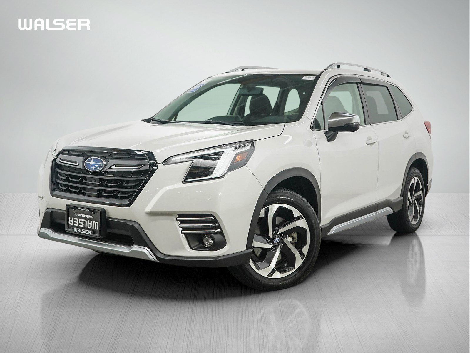 Used 2024 Crystal White Pearl Subaru Touring image 1
