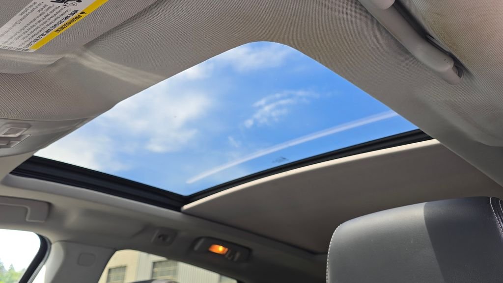 Used 2012 Radiant Silver Metallic Cadillac Luxury image 22