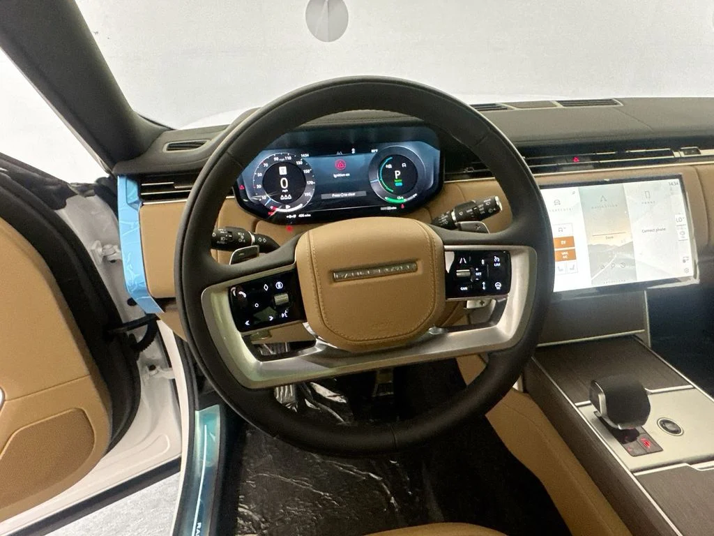 New 2026 Ostuni Pearl White Land Rover SE image 11