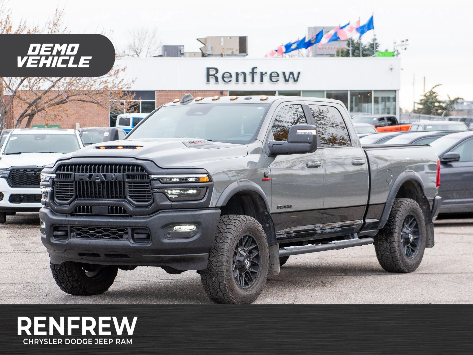 Used 2026 Grey RAM Rebel* Crew Cab 4x4, 2 Inch Lift, 35 Inch Tires, Winch, Trigger Industries MudFlaps image 1