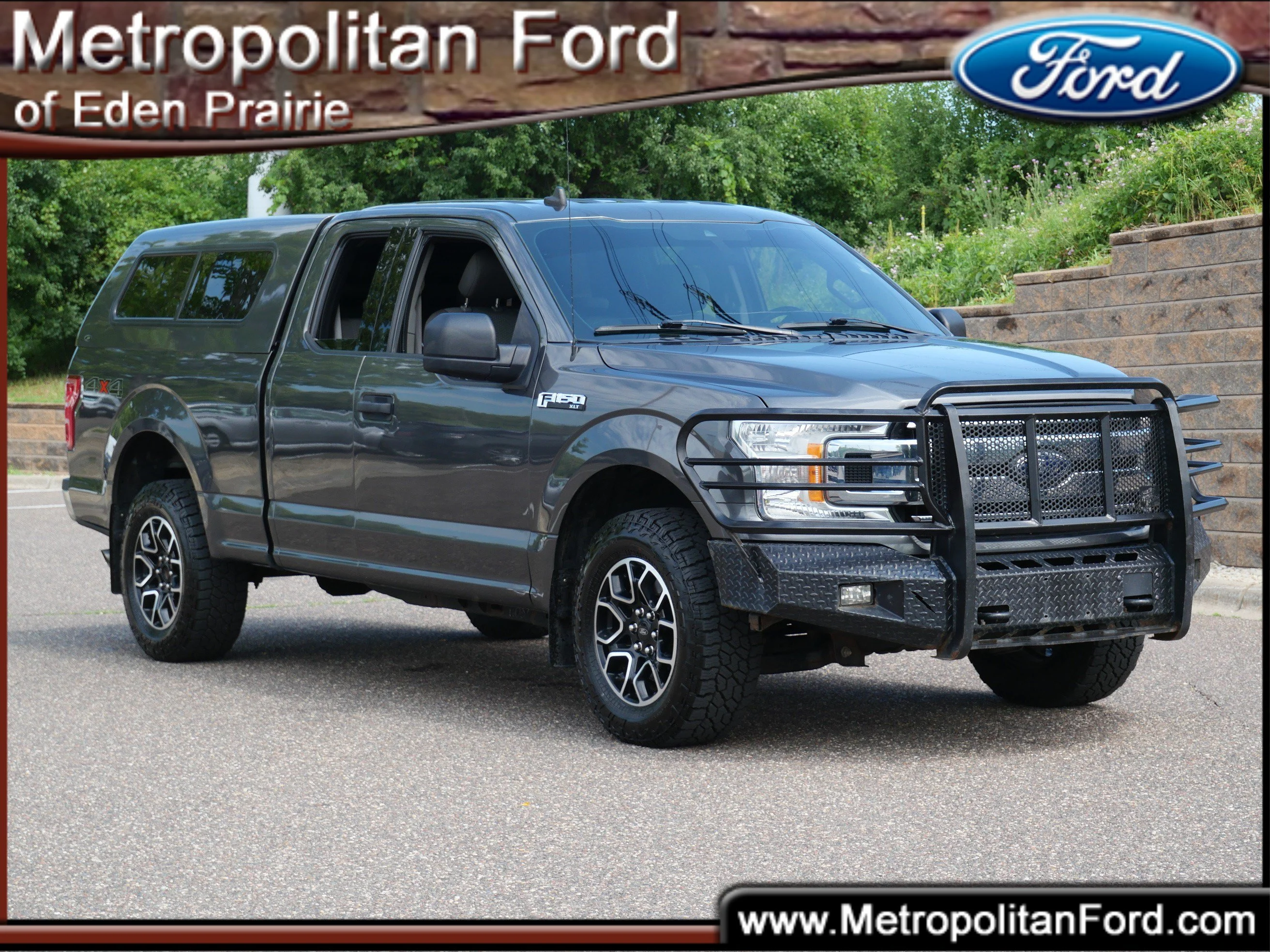 Used 2019 Magnetic Metallic Ford XLT 4WD SuperCab 6.5 Box image 1