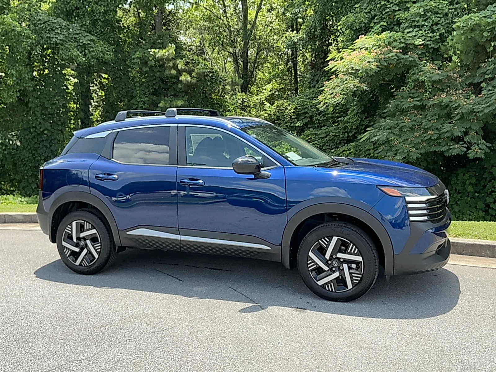 New 2026 Deep Blue Pearl Nissan SV image 1