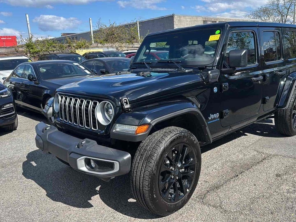 Used 2025 Black Jeep Sahara 4xe image 1