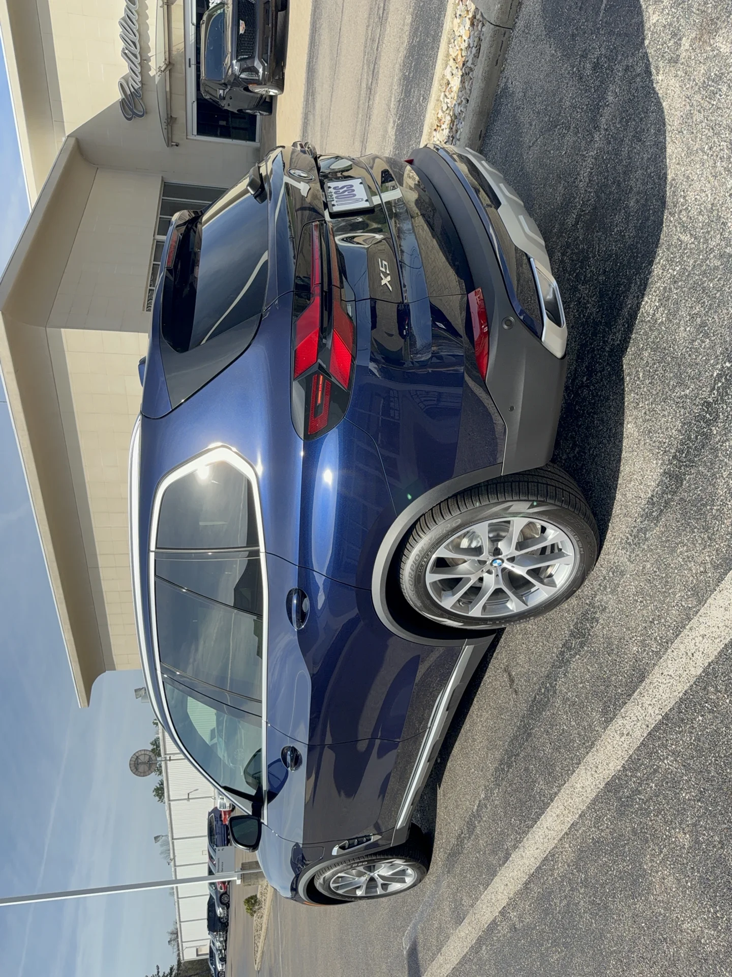 New 2026 Tanzanite Blue II Metallic BMW xDrive50e image 8