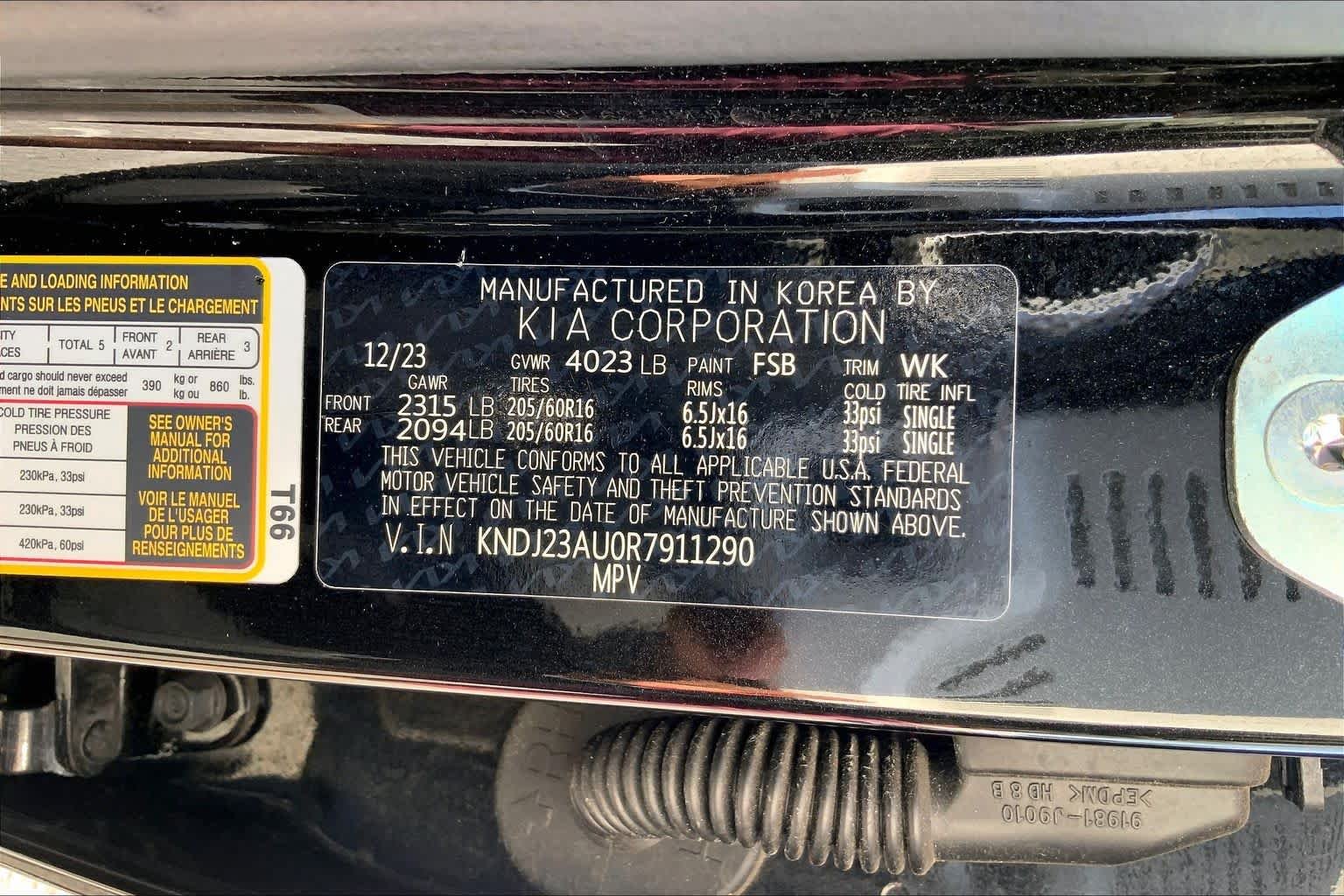 Used 2024 Fusion Black Kia LX image 30