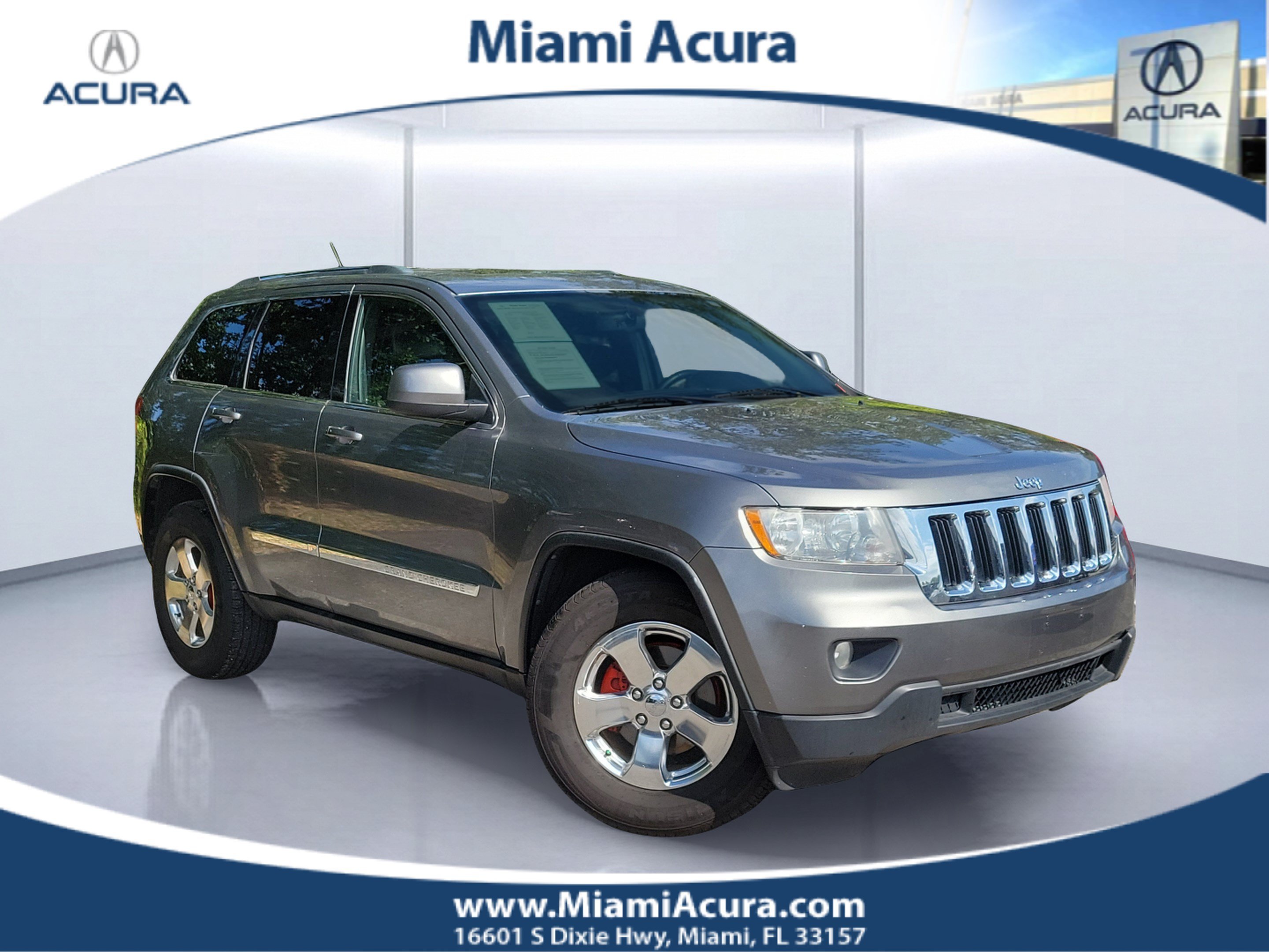 Used 2012 Mineral Gray Metallic Clearcoat Jeep Laredo image 1