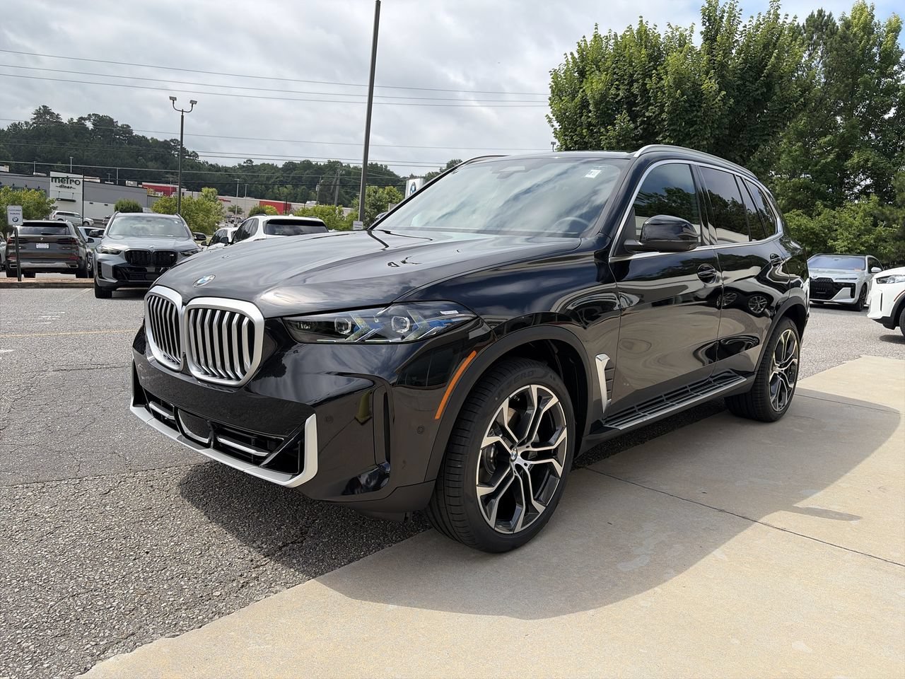 New 2026 Black Sapphire Metallic BMW xDrive40i image 4