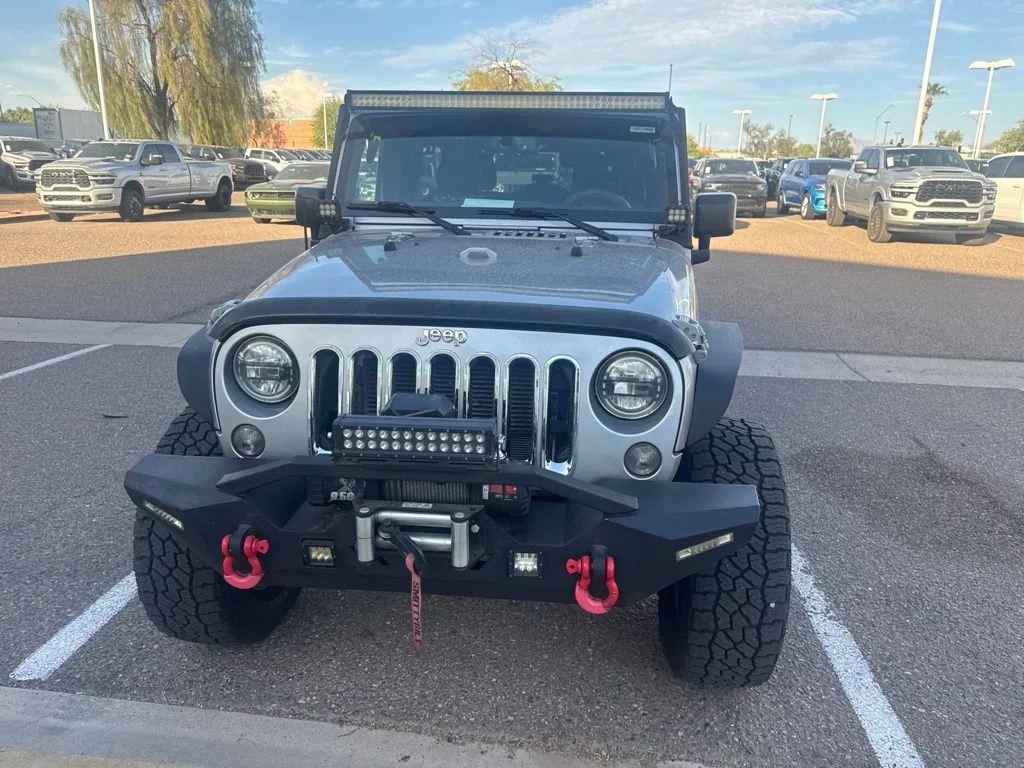 Used 2016 Silver Jeep Unlimited Sport image 2