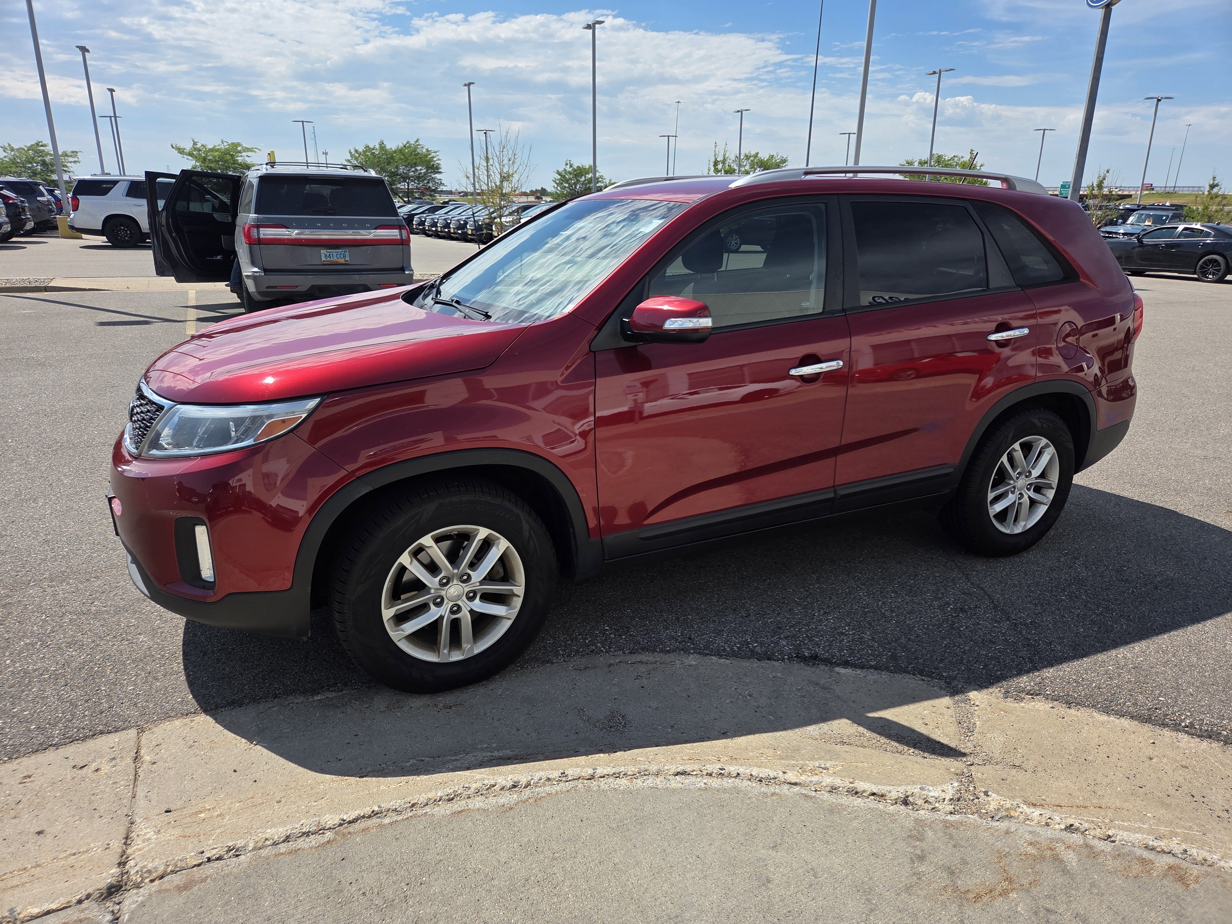 Used 2015 Remington Red Metallic Kia LX image 2