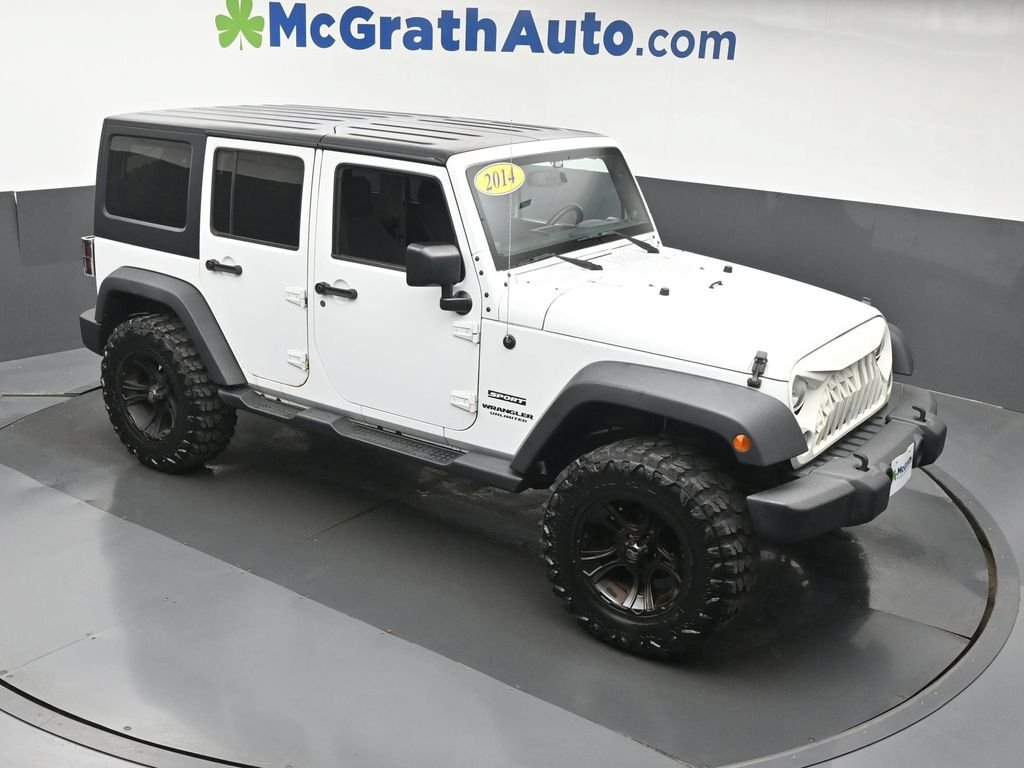 Used 2014 White Jeep Unlimited Sport image 3