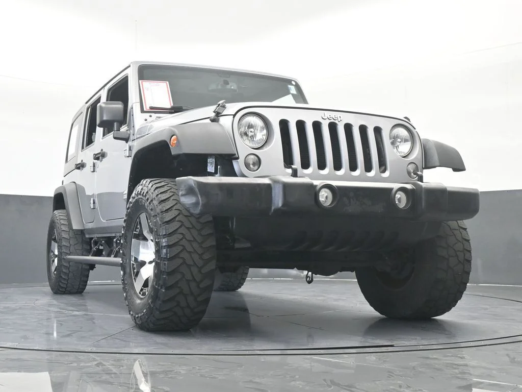 Used 2016 Billet Silver Metallic Clearcoat Jeep Unlimited Sport image 53