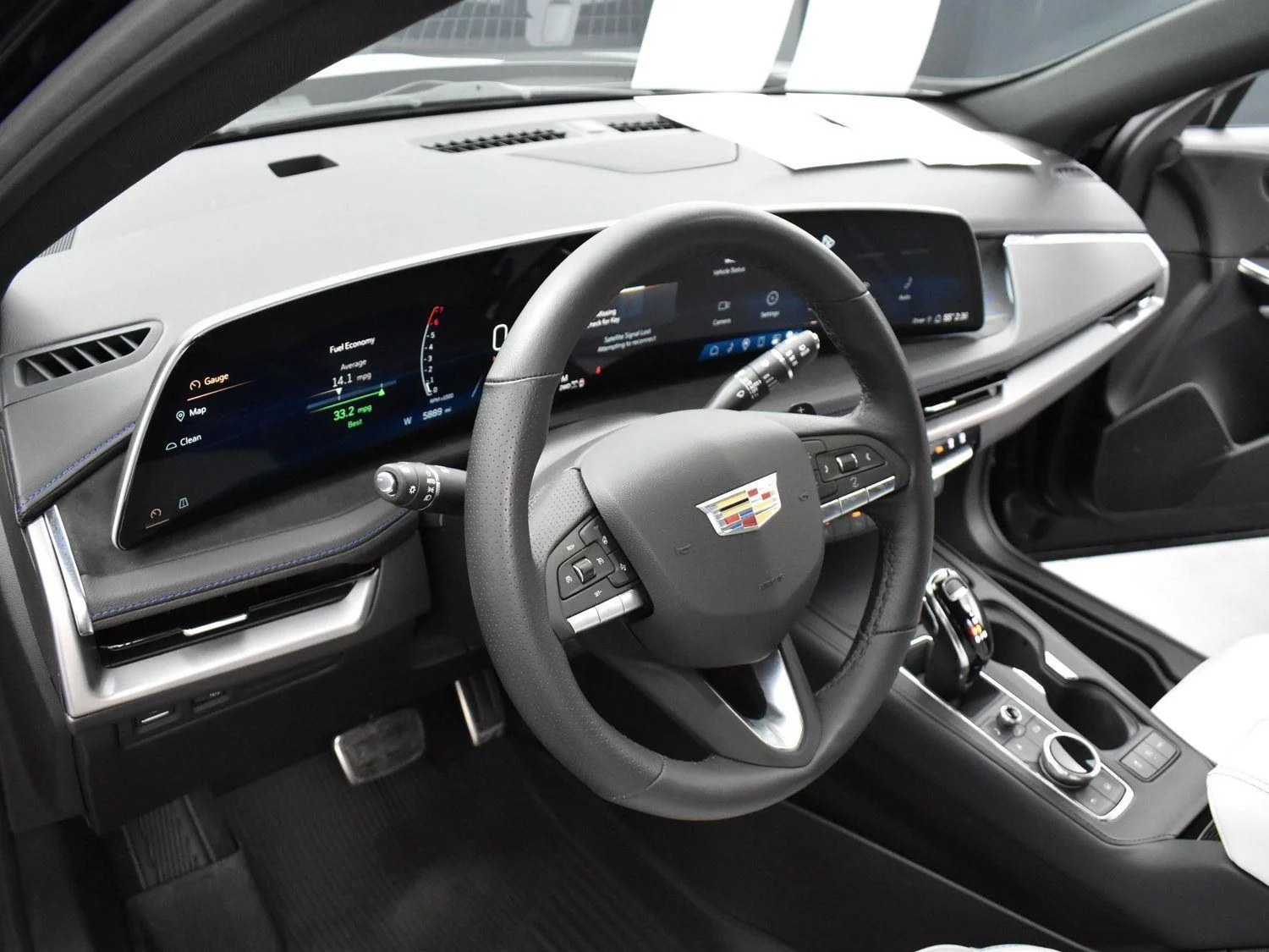 Used 2024 Stellar Black Metallic Cadillac Sport image 14