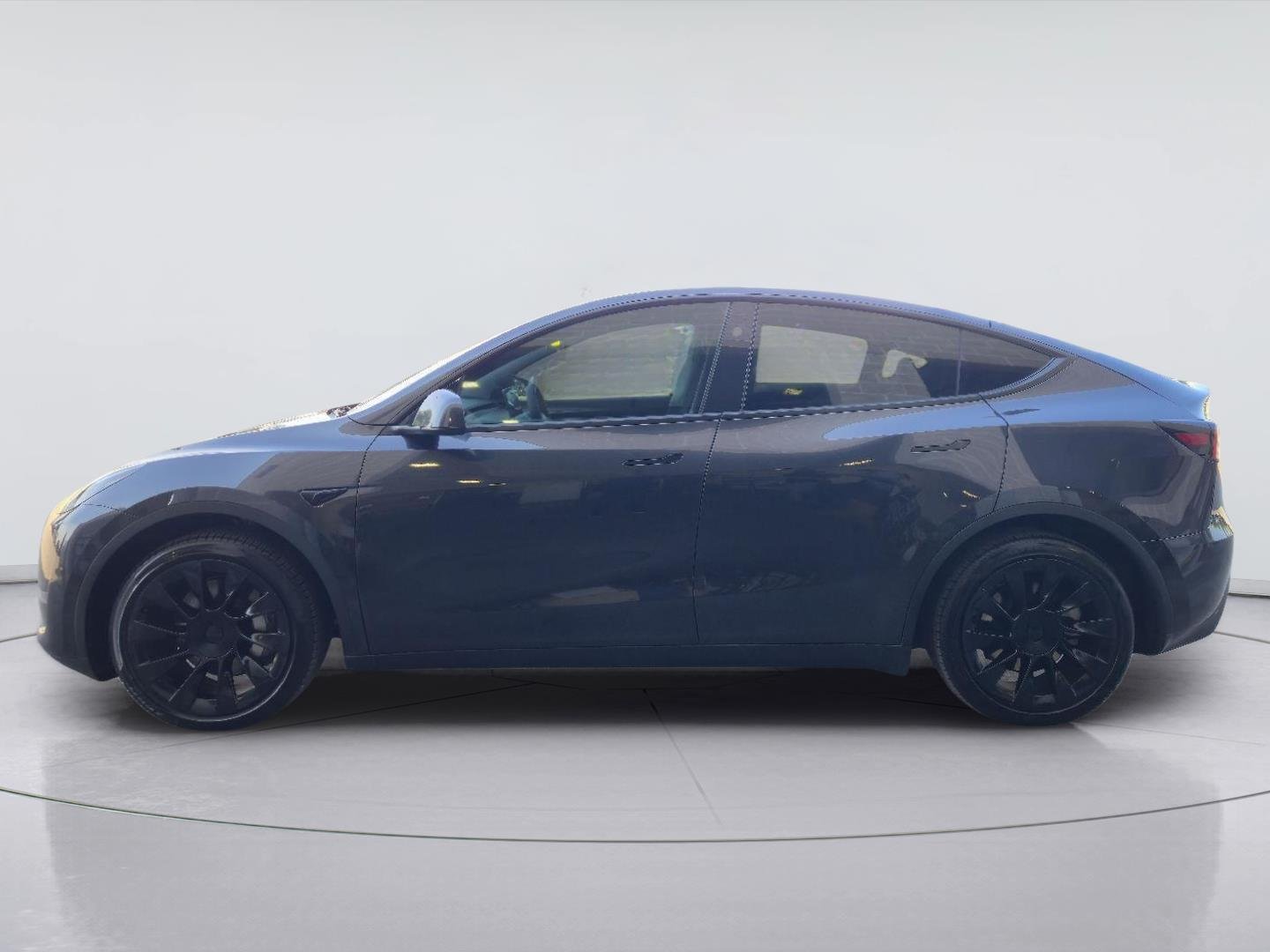 Used 2024 Solid Black Tesla Long Range image 2