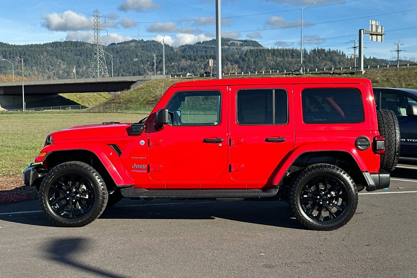 Used 2022 Red Jeep Unlimited Sahara 4xe image 6
