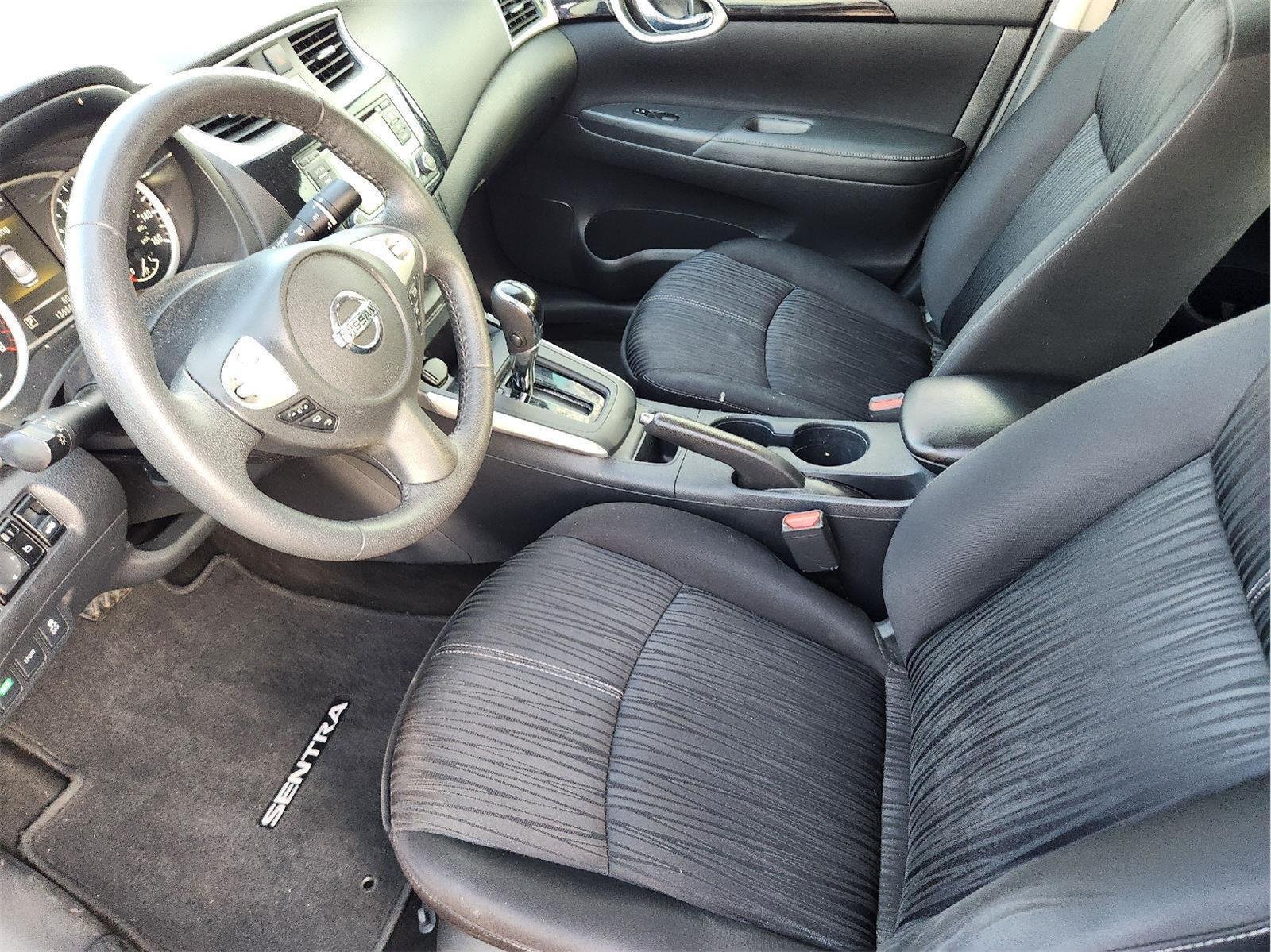 Used 2016 Super Black Nissan SV image 13