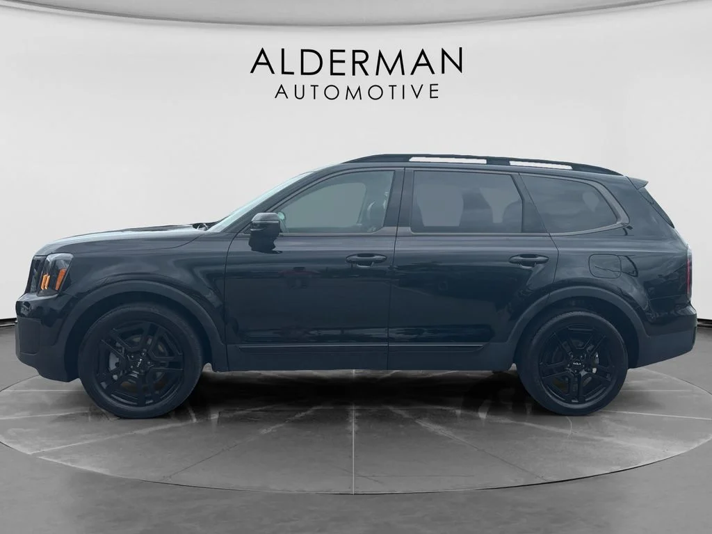Used 2024 Black Kia EX X-Line image 2