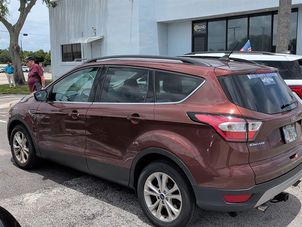Used 2018 Ford Escape SEL with VIN 1FMCU0HD2JUA49196 for sale in Cocoa, FL