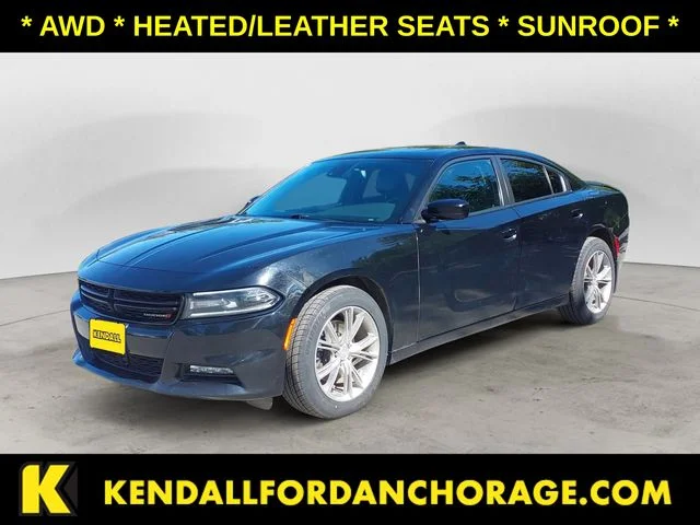 Used 2016 Pitch Black Clearcoat Dodge SXT image 1