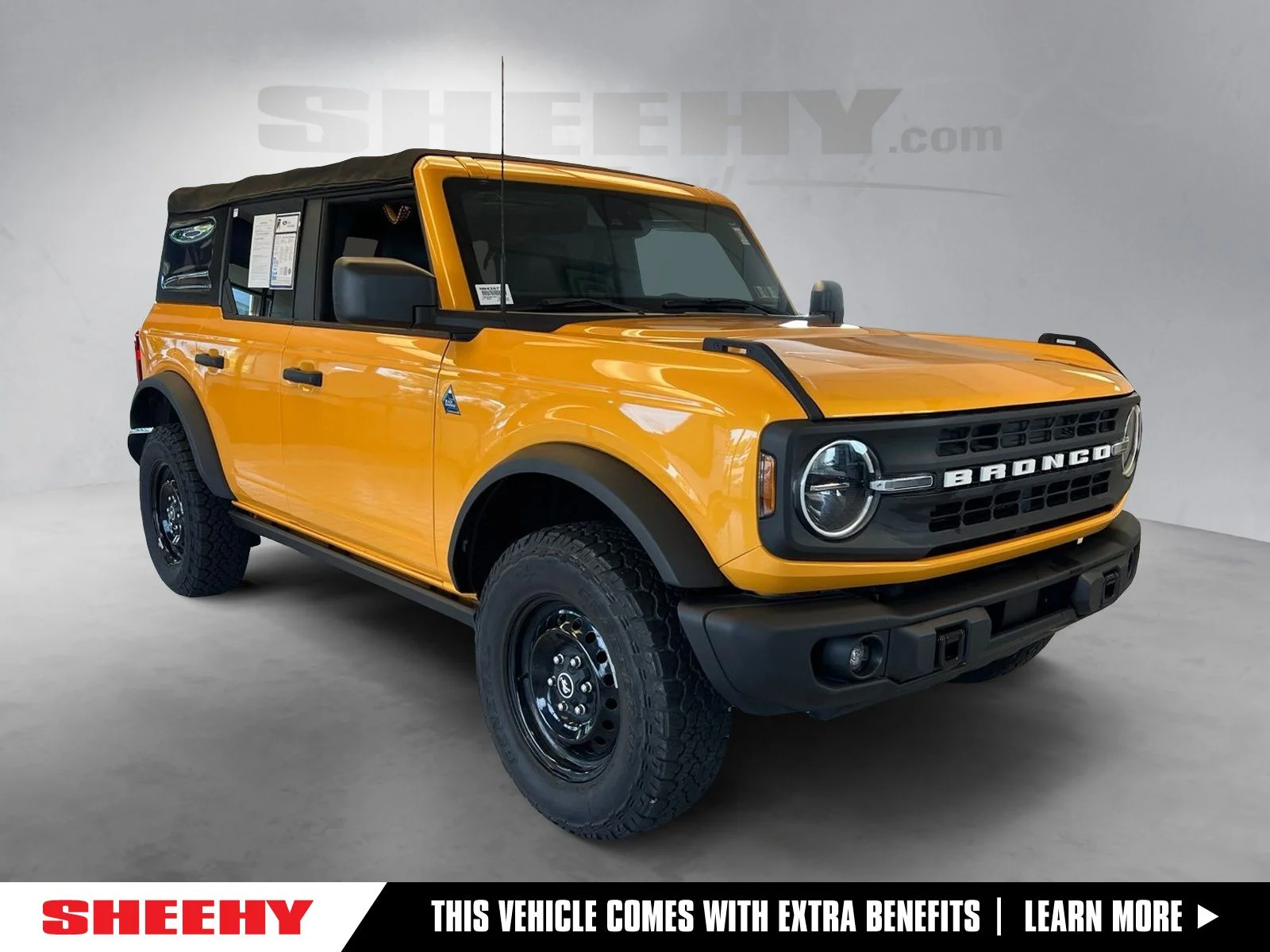 Certified Used 2022 Orange Metallic Ford Black Diamond image 1