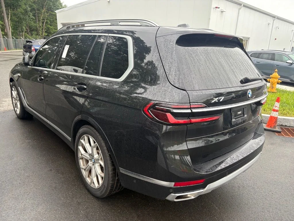 Certified Used 2023 Black Sapphire Metallic BMW xDrive40i image 3