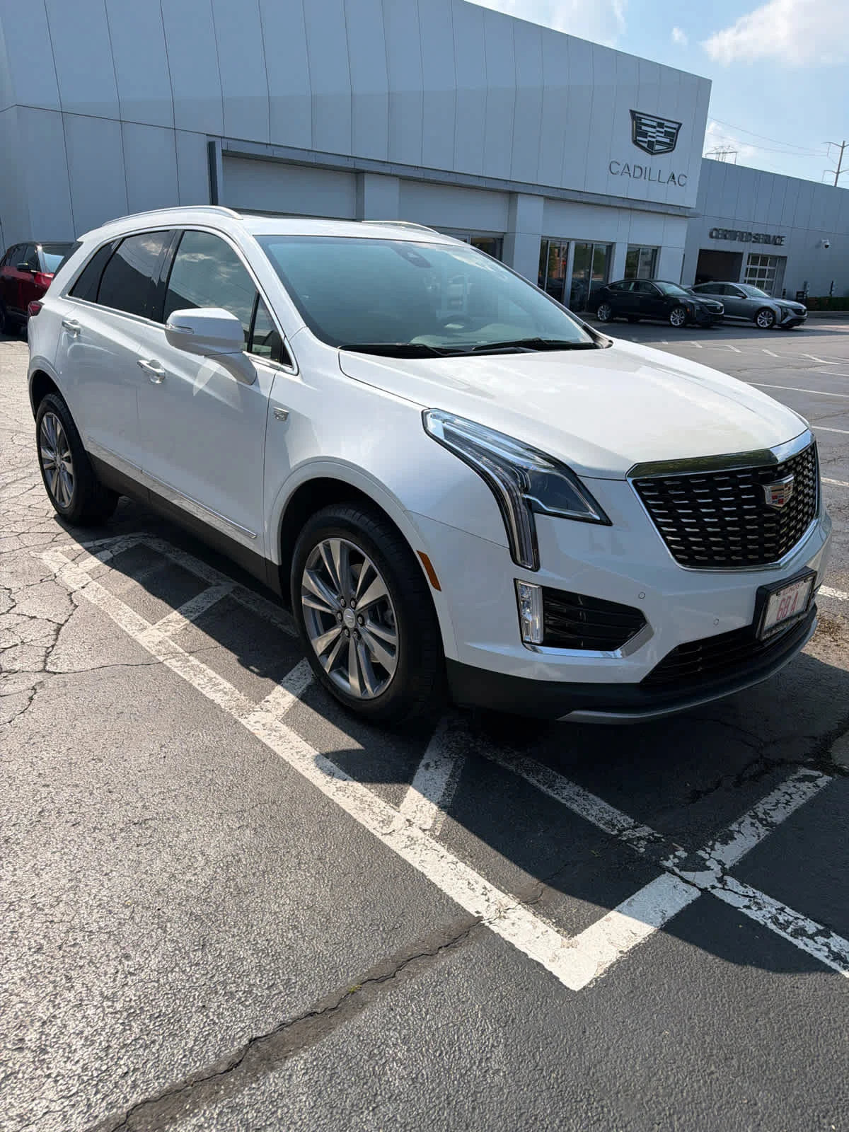 Used 2024 Crystal White Tricoat Cadillac Premium Luxury image 1