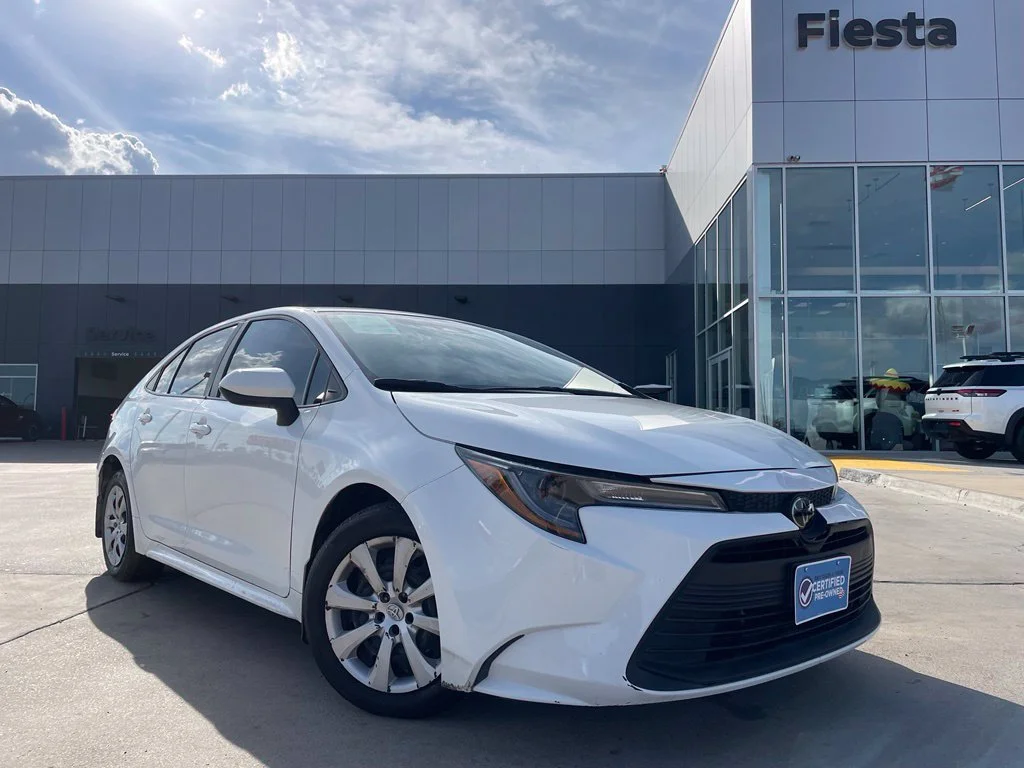 Used 2025 White Toyota LE image 1