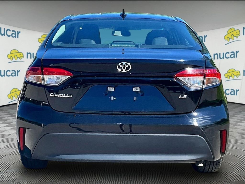Used 2024 Black Toyota LE image 5
