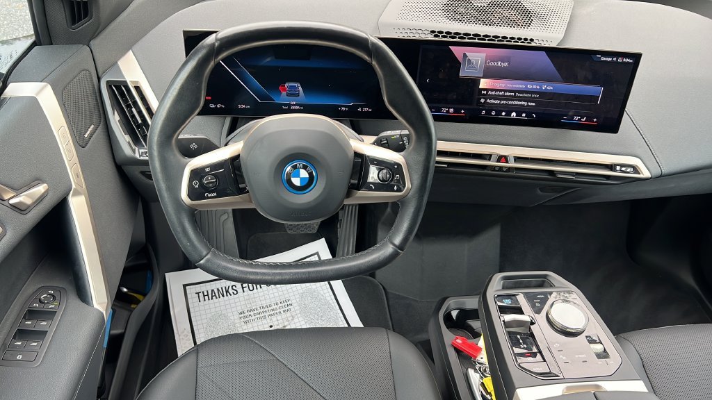 Certified Used 2024 Blue BMW xDrive50 image 11