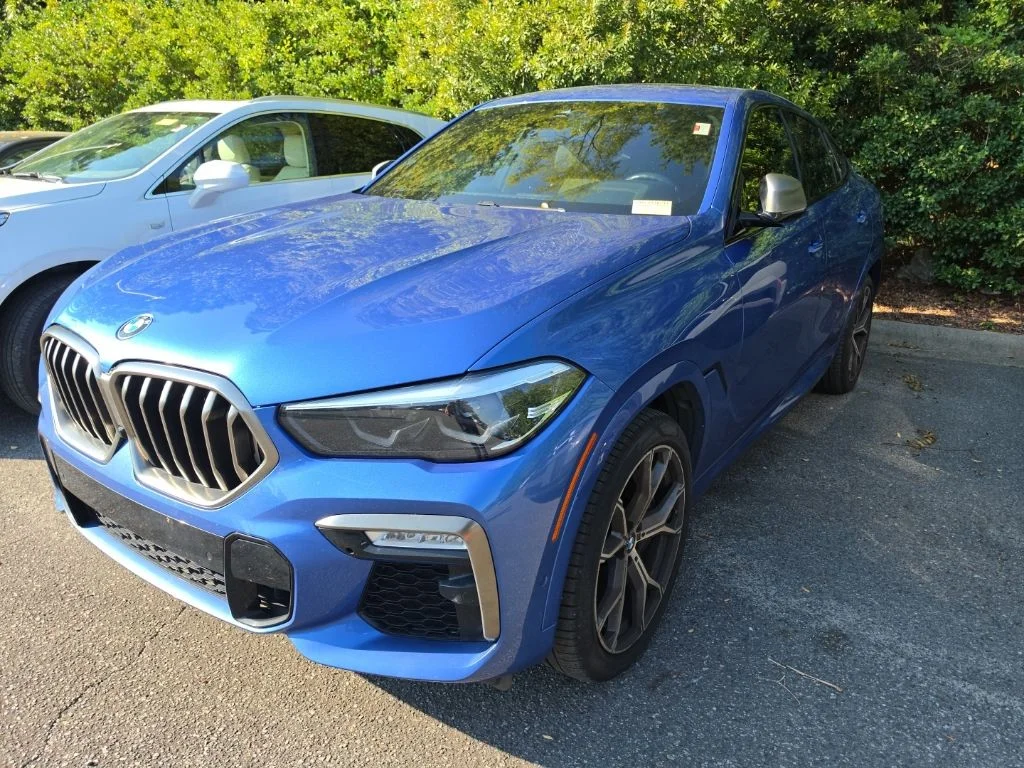 Used 2020 Riverside Blue Metallic BMW M50i image 1