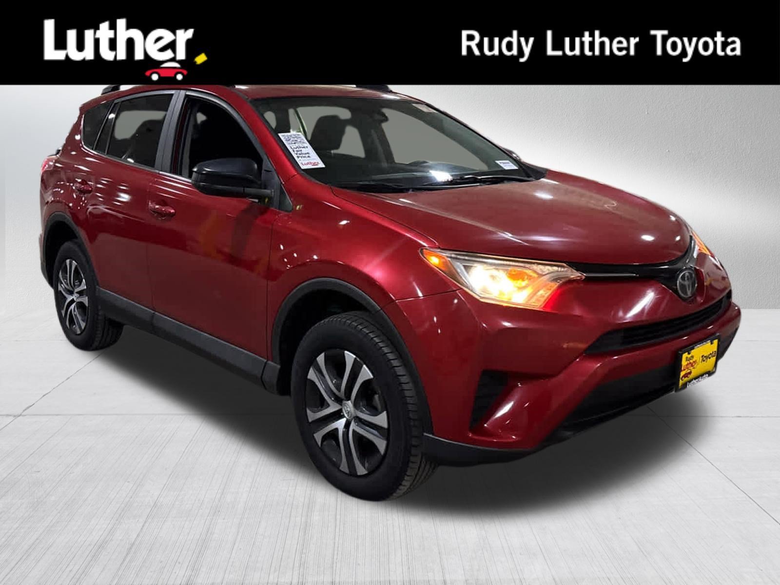 Certified Used 2017 Barcelona Red Metallic Toyota LE image 1