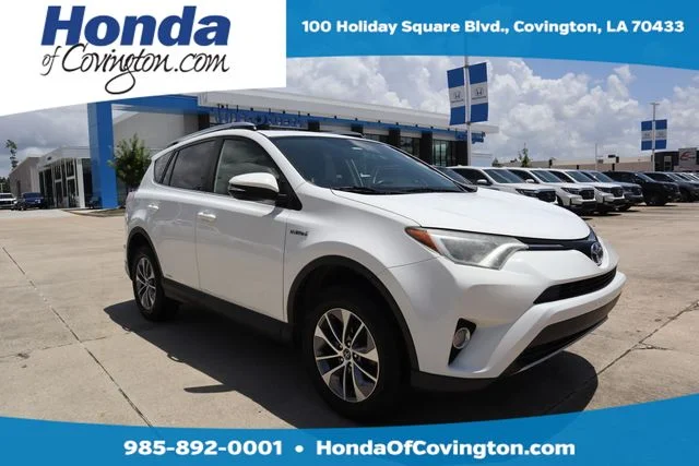 Used 2016 Super White Toyota XLE image 1