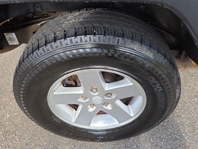 Used 2013 Beige Jeep Sport image 13