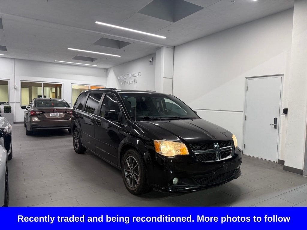 Used 2016 Black Dodge SXT image 1