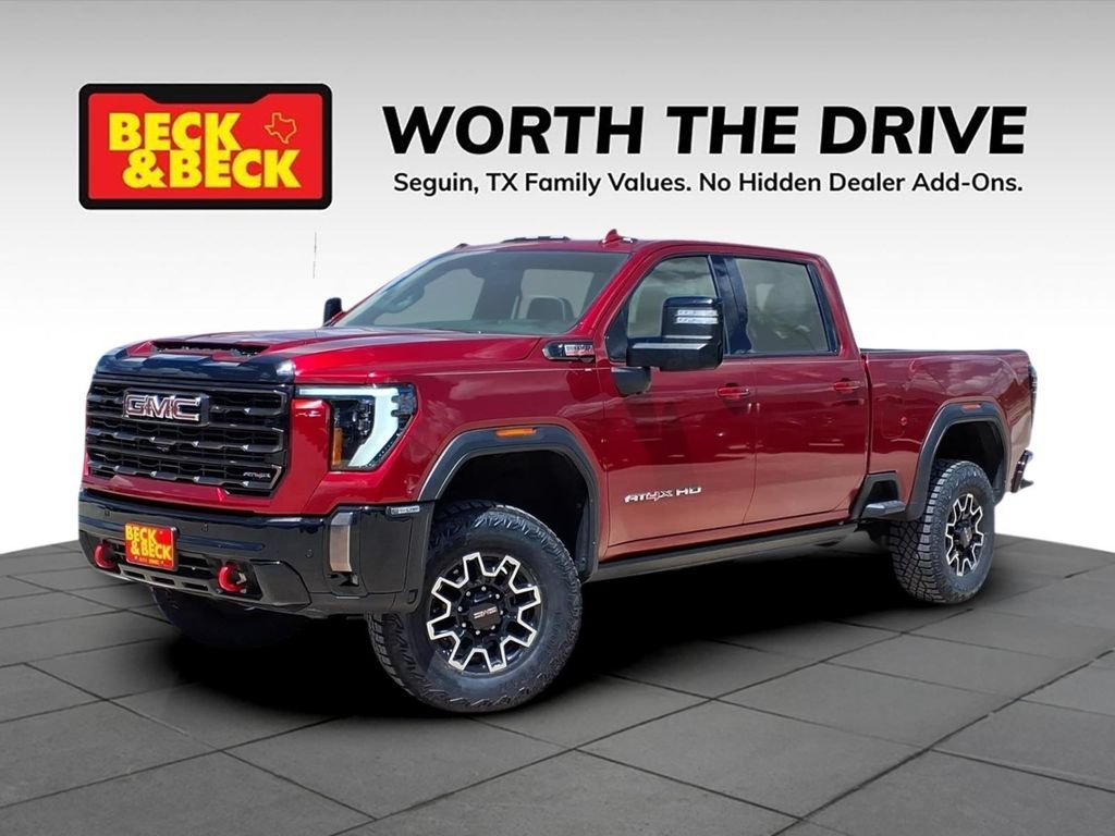 Used 2024 Volcanic Red Tintcoat GMC AT4X image 1