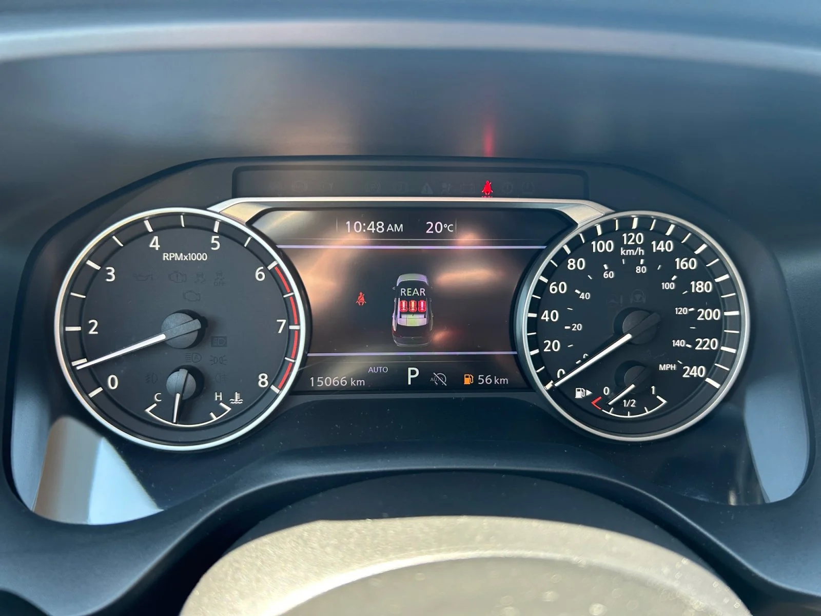 Used 2024 RED METALLIC Nissan SV Moonroof AWD image 22
