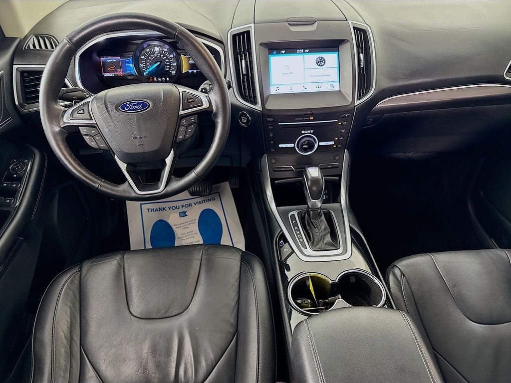Used 2016 Gray Metallic Ford Titanium image 27