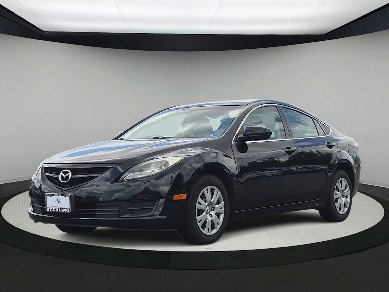 Used 2011 Ebony Black Mazda i Sport image 4
