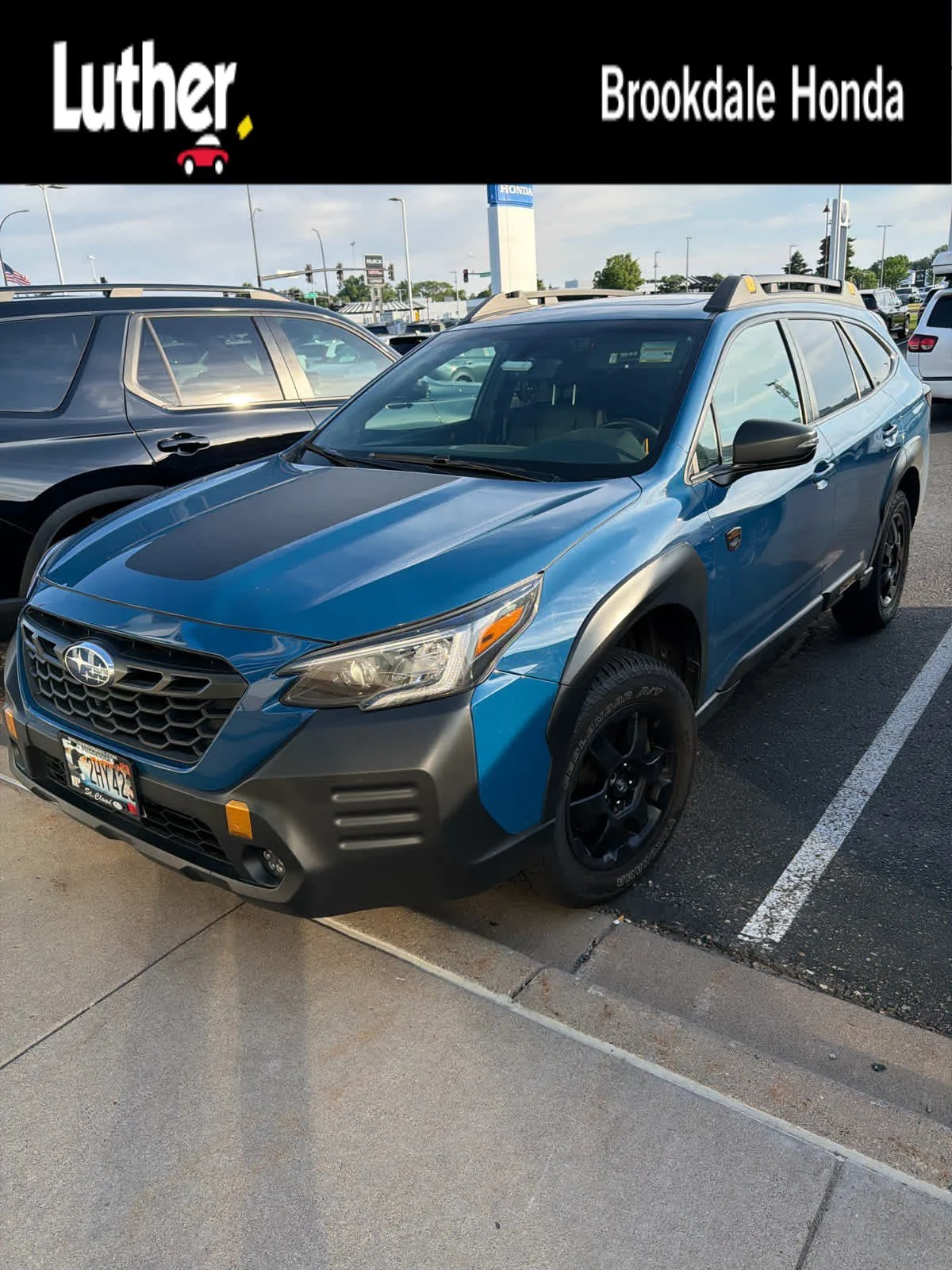 Used 2022 Geyser Blue Subaru Wilderness image 1