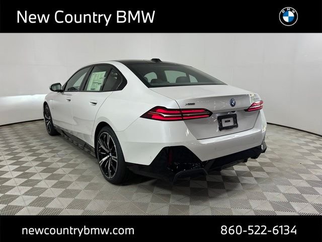 New 2026 Mineral White Metallic BMW 550e xDrive image 5