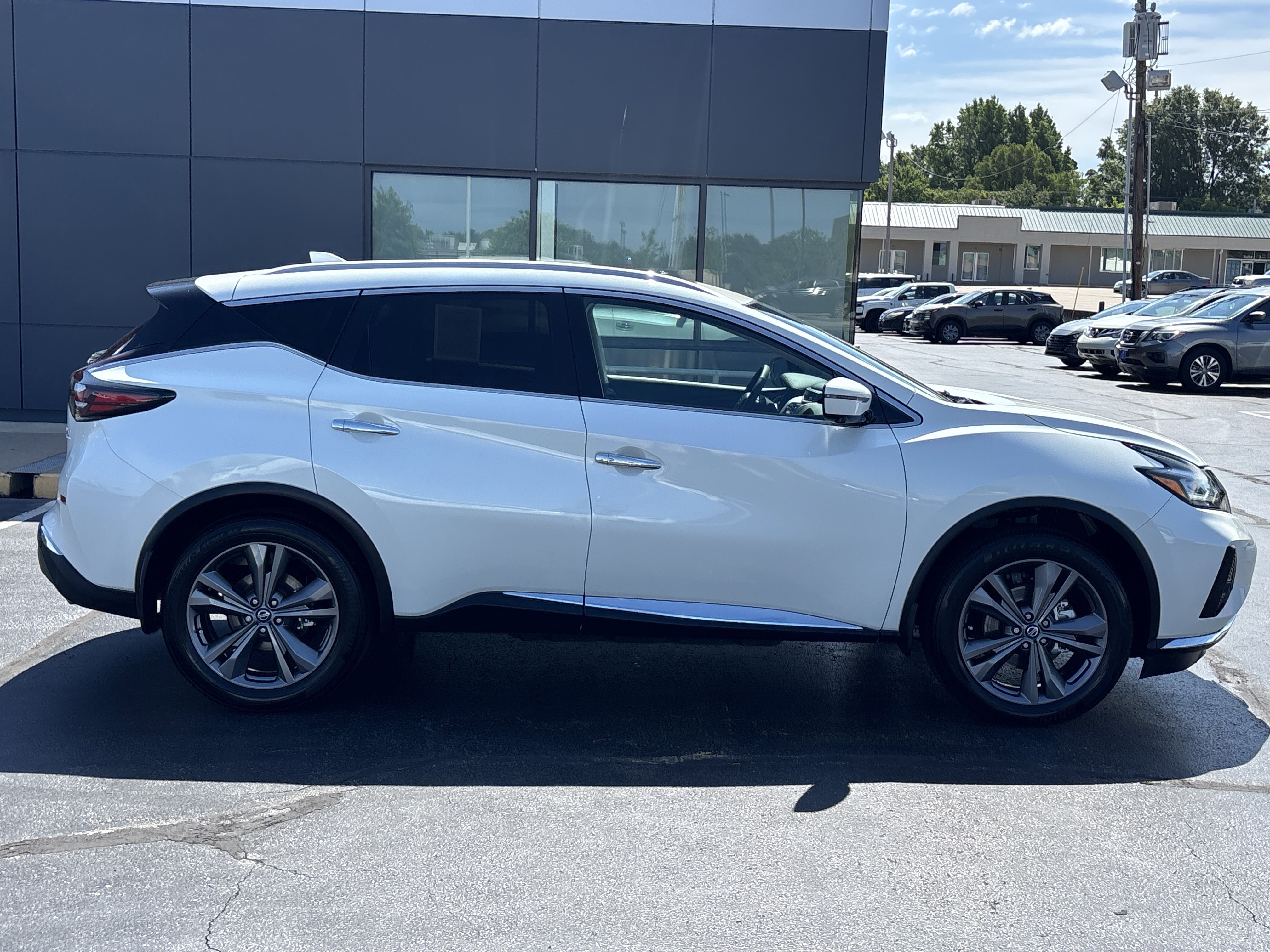 Certified Used 2021 Pearl White Tricoat Nissan Platinum AWD image 2