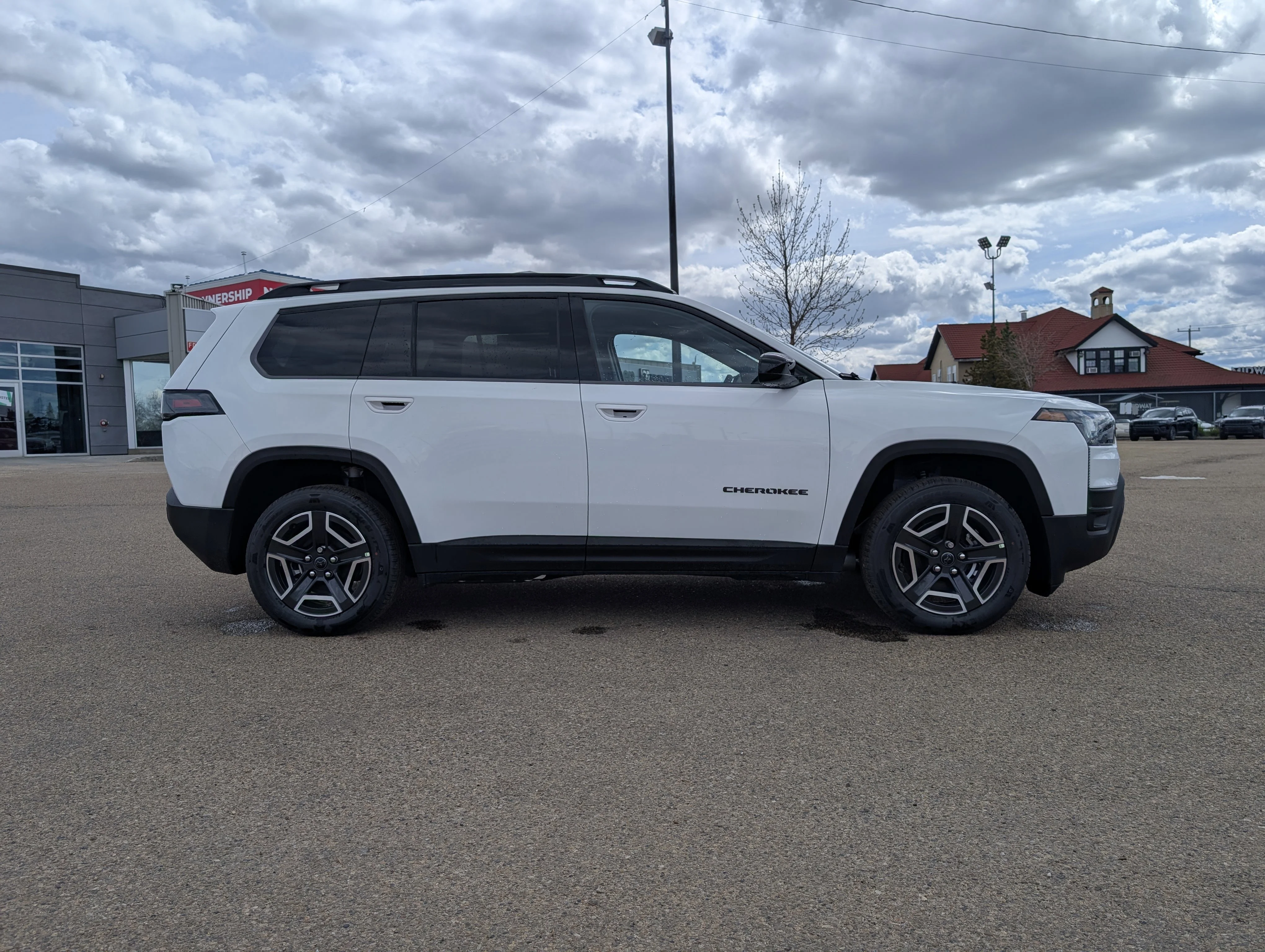New 2026 Bright White Jeep Laredo image 8