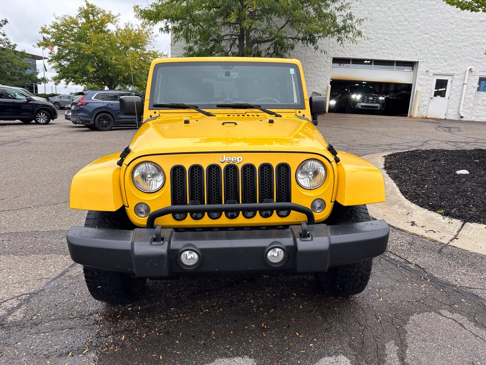 Used 2015 Baja Yellow Clearcoat Jeep Sahara image 12