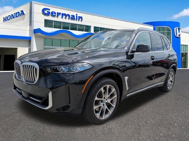 Used 2024 Black Sapphire Metallic BMW xDrive40i image 1