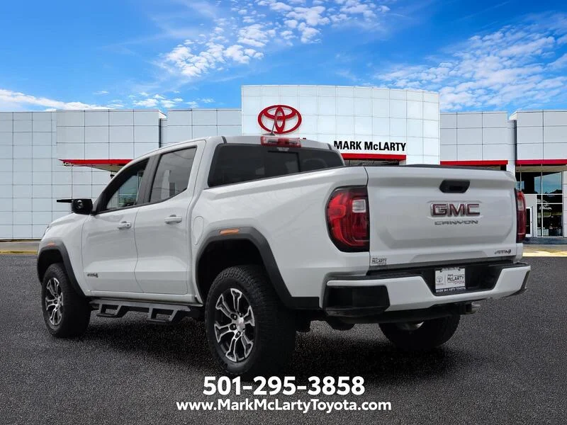 Used 2023 Summit White GMC 4WD Crew Cab AT4 image 3