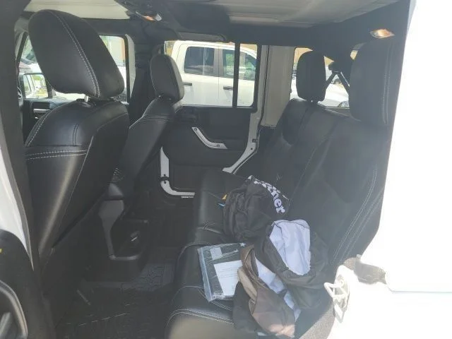 Used 2018 White Jeep Unlimited Sahara image 12
