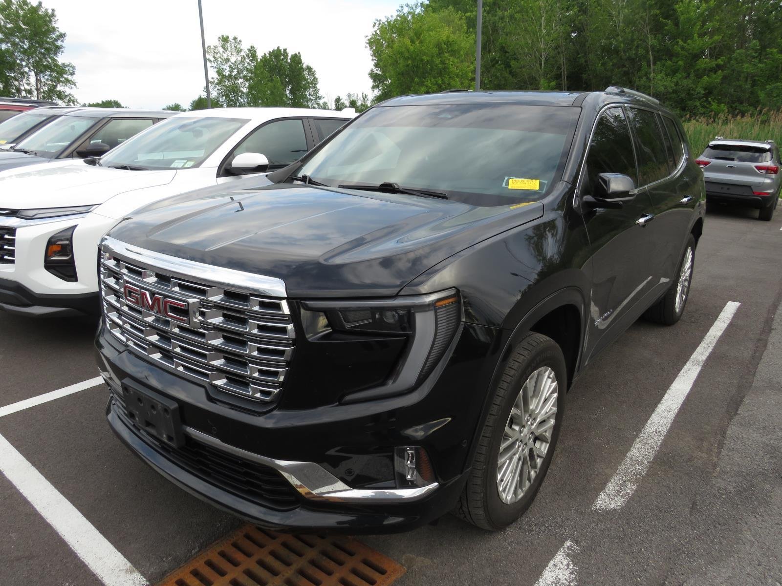 Used 2024 EBONY TWILIGHT METALLIC GMC  image 7