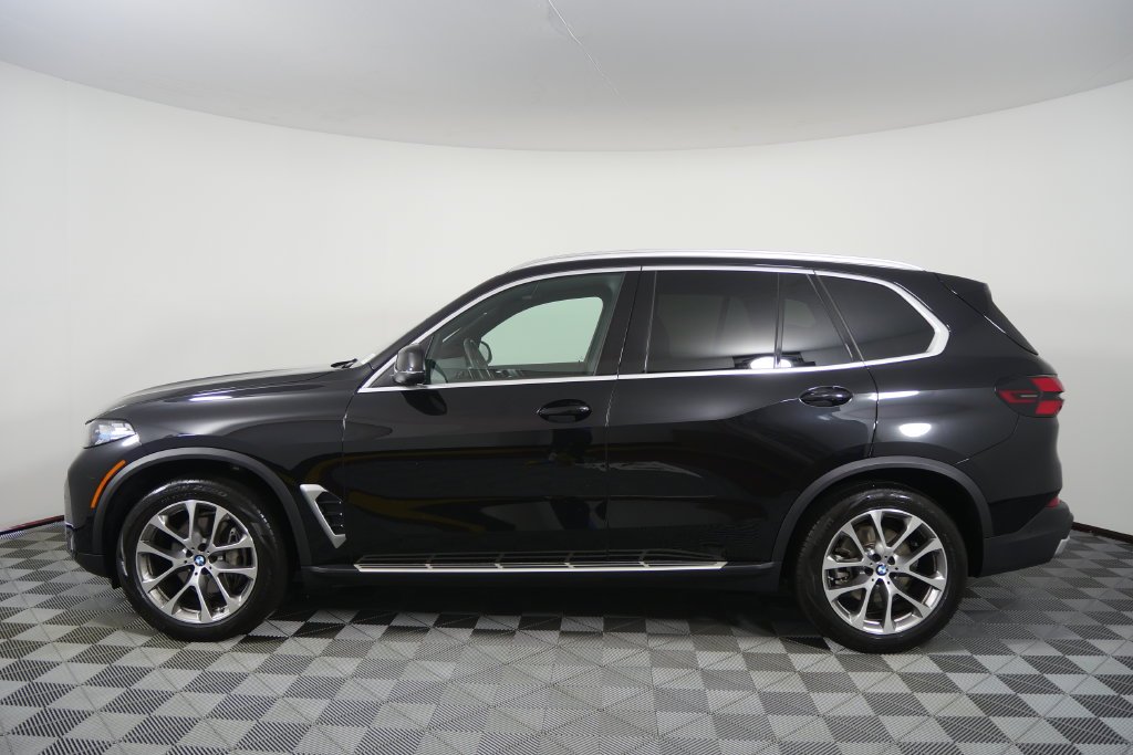 Certified Used 2024 Black Sapphire Metallic BMW sDrive40i image 7