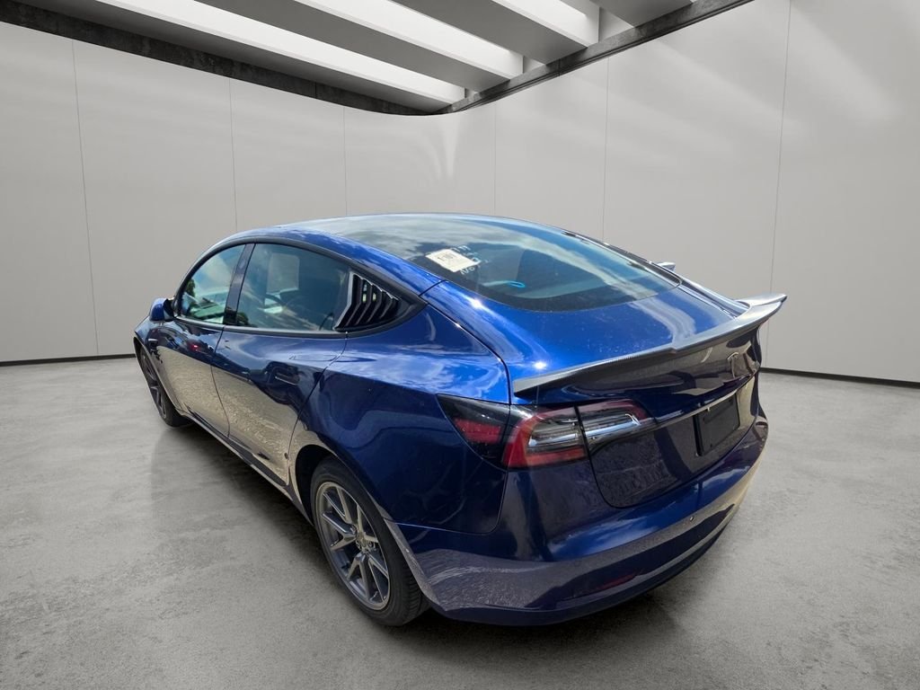 Used 2022 Deep Blue Metallic Tesla Base image 4