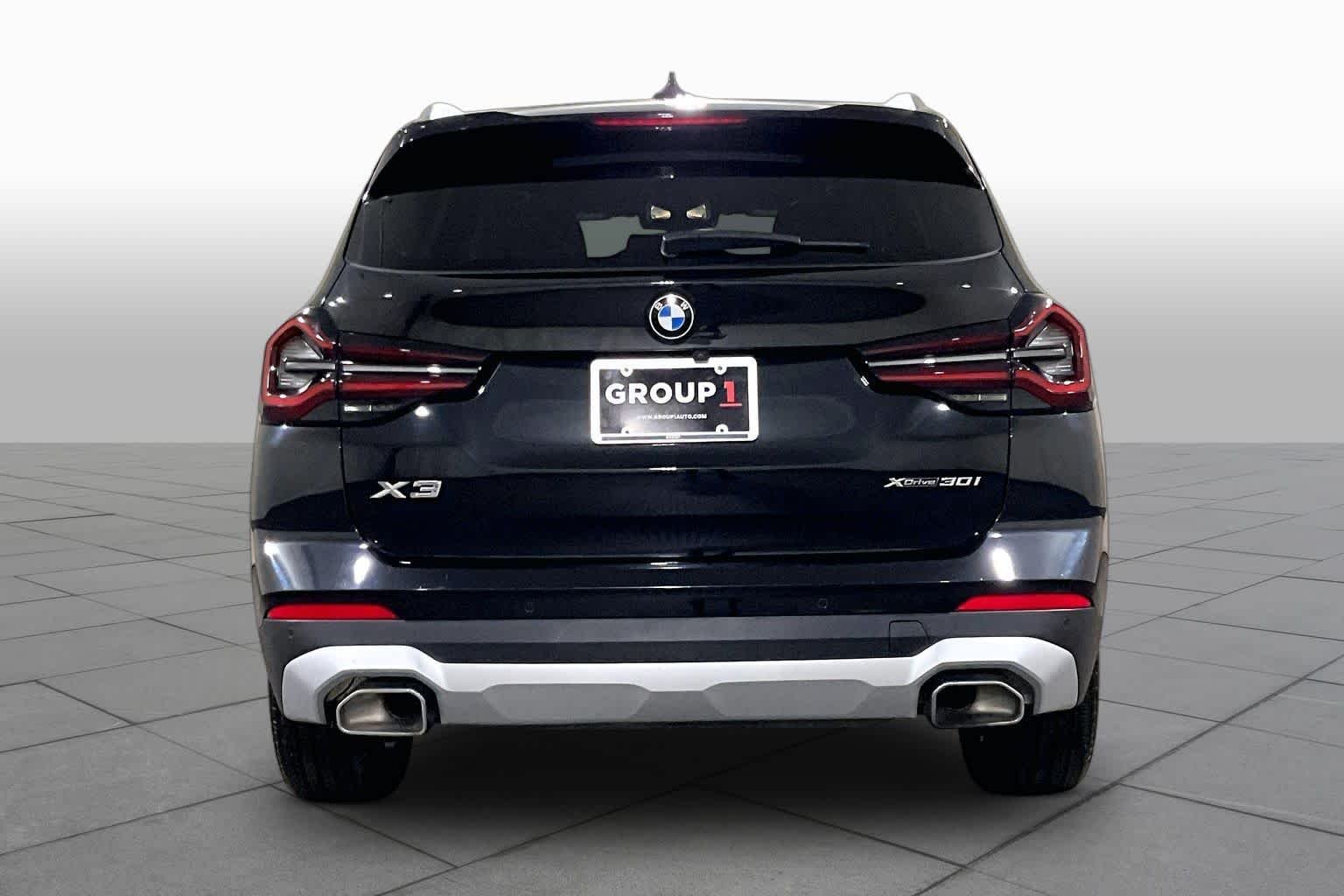 Used 2022 Black Sapphire Metallic BMW xDrive30i image 4